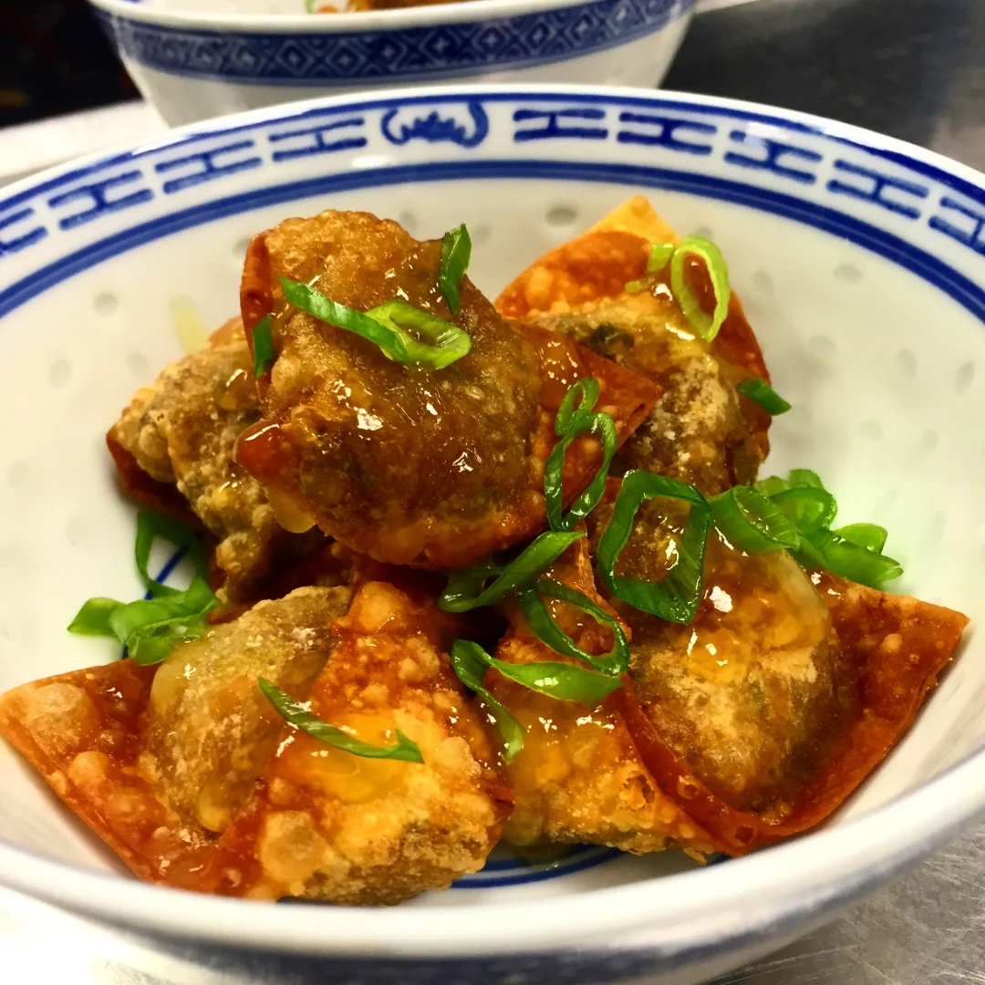 Mushroom wontons in spicy broth